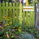Gartenzaun mit Eingangsschild